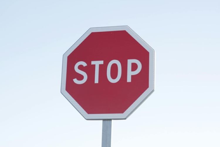 Red Stop Sign on White Background